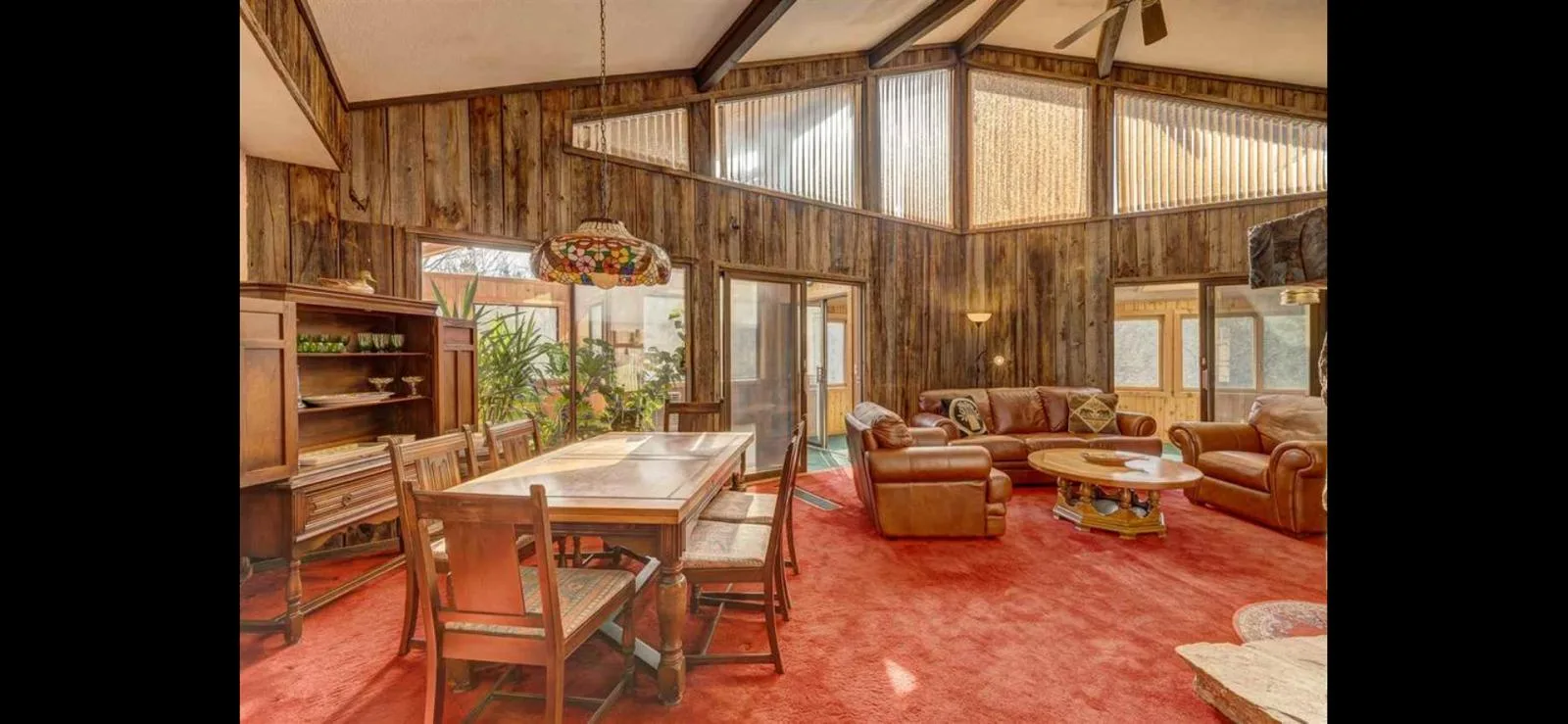 The great room and dining area under timber beams